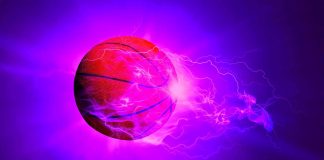 Ball in fire flames on dark background. Mixed media